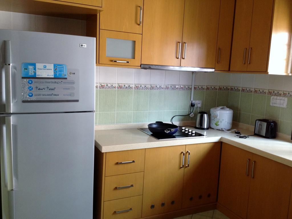 T & H Vacation Condo @Marina Court Кота-Кинабалу Номер фото
